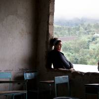 women sitting in window of classroom